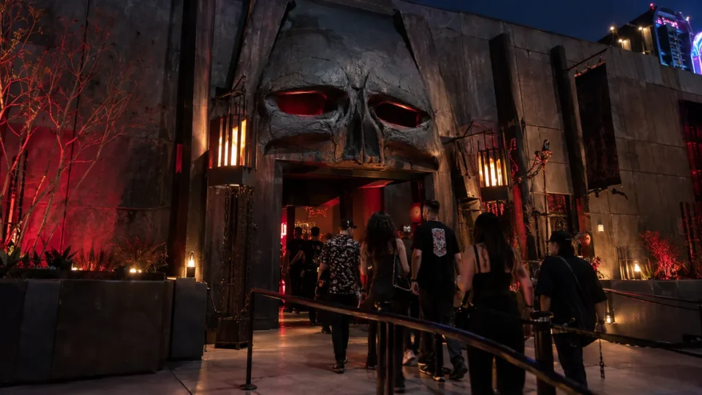 Visitors entering a dark year-round horror attraction at AREA15 in Las Vegas.